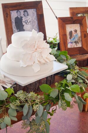 Ivory Wedding Cake Surrounded by Garland