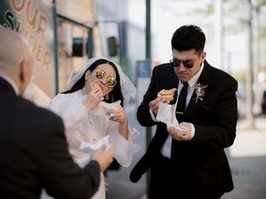 Bride and Groom in Sunglasses Eating Garlic Knots