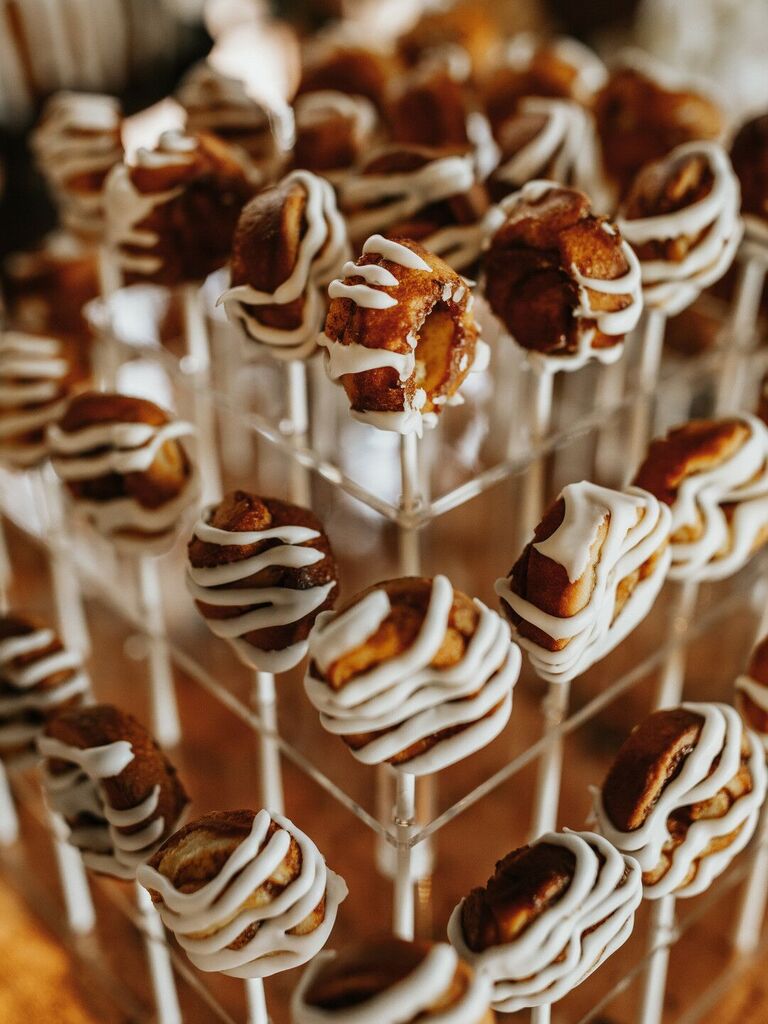 Mini cinnamon roll on a stick idea for a bridal shower. 