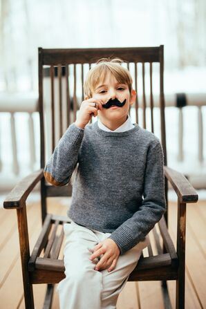Mustached Ring Bearer for Winter Wedding