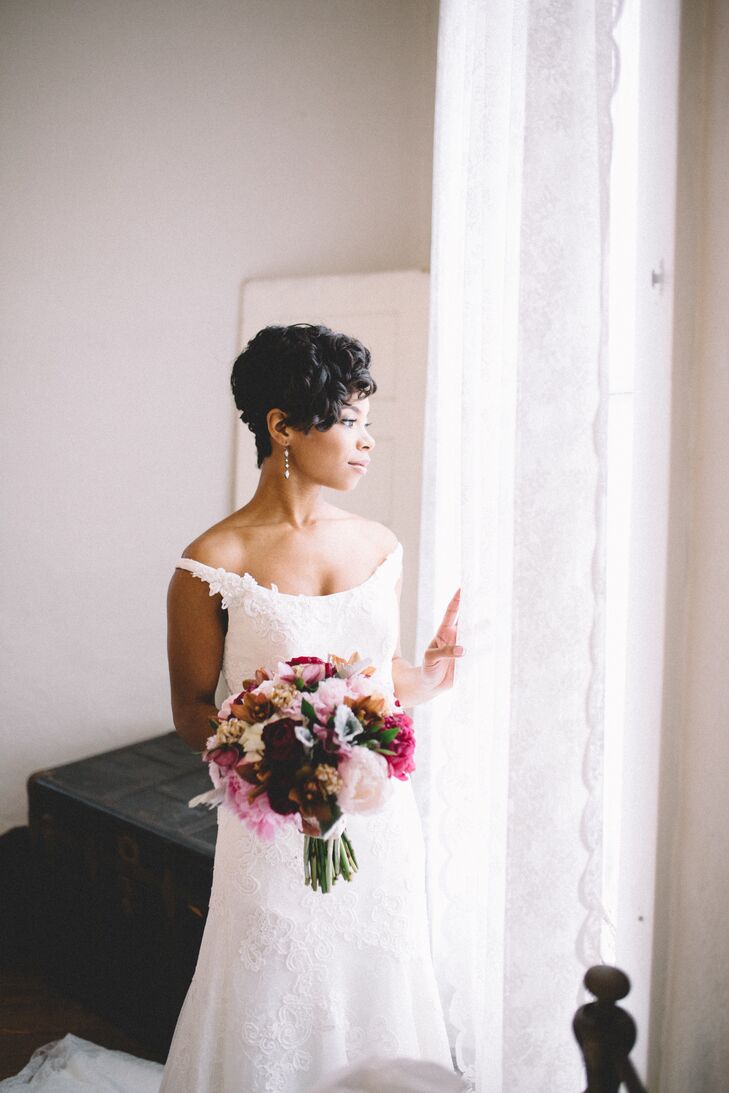 In keeping with the vintage theme, Morgan decided on a classic beauty look for her walk down the aisle. She opted for an elegant curled hairstyle, with finger waves on the sides and tight curls on top. “With the makeup, I wanted to look as natural as possible, with pinks and berries as my palette,” Morgan says. “On my eyes we did a smoky gold look. And for my lips we did a pink-nude for the ceremony and a showstopping berry color for the reception .”