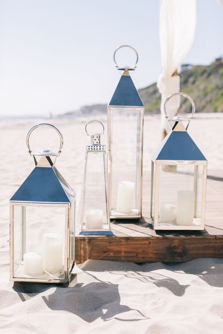 Oversize silver lanterns filled with candles provided romantic lighting later in the evening.