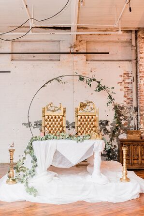 Whimsical Sweetheart Table with Gold Thrones, White Linen and Circular Arch