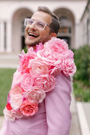 Groom in Custom Pink Tuxedo With a Cascading Silk Floral Lapel, Boutonniere Alternative