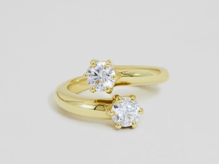 two stone engagement ring in yellow gold setting