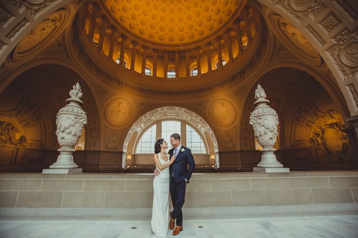 Married Couple Embrace in City Hall