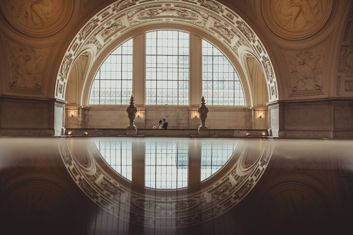 The couple stood near each other in the open, elegant space of the San Francisco City Hall venue.