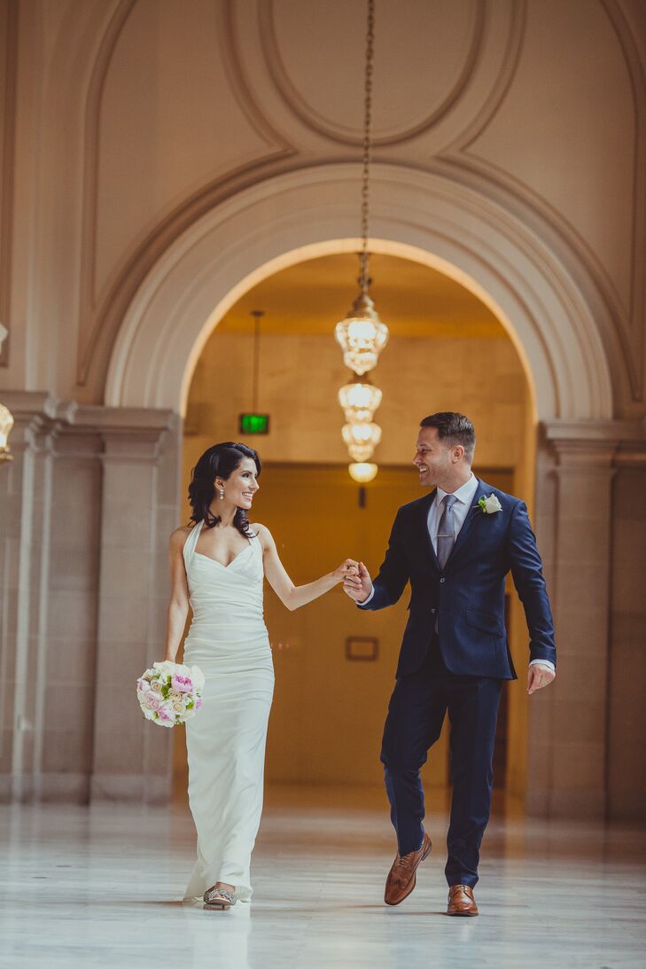 Married Couple Holding Hands at Venue