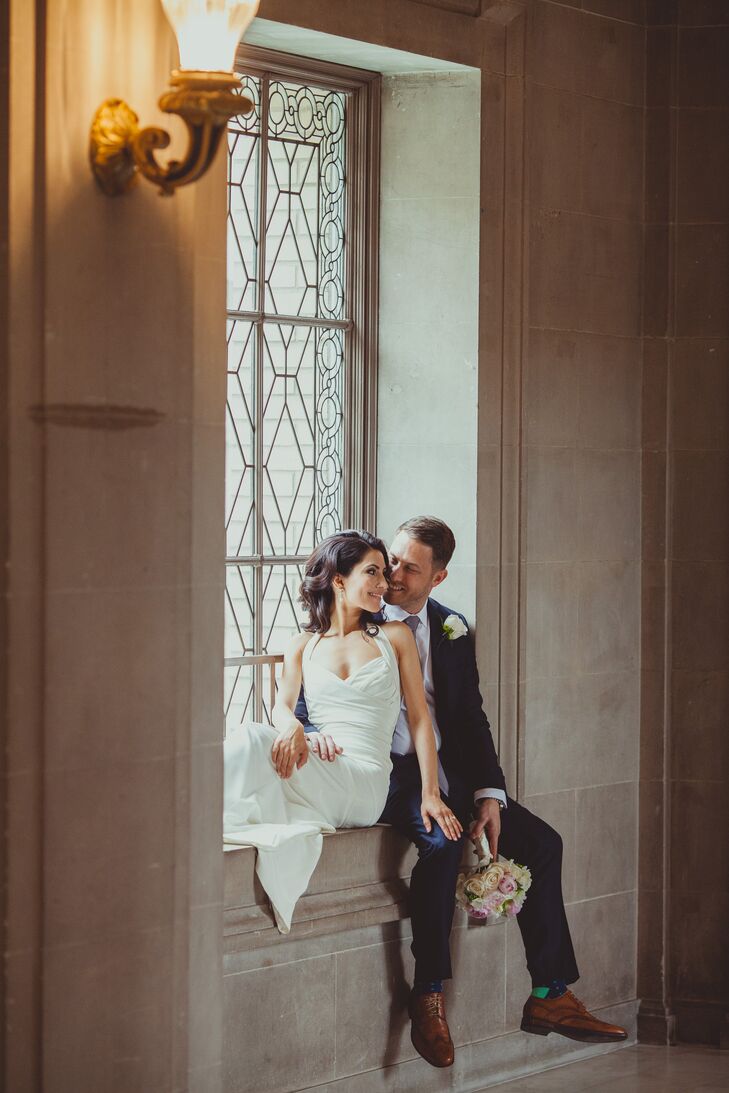 Married Couple Sitting on Window Sill