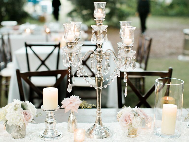 Romantic wedding candelabras at fairytale-themed wedding