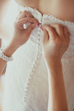 Buttoning Up Back of Wedding Dress