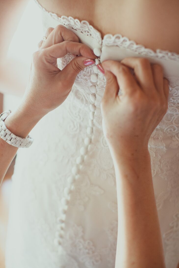 Buttoning Up Back of Wedding Dress