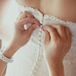 Buttoning Up Back of Wedding Dress