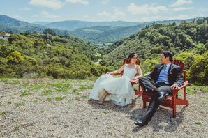 Couple Sitting With Natural Backdrop