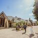 Couple in Front of Rented House