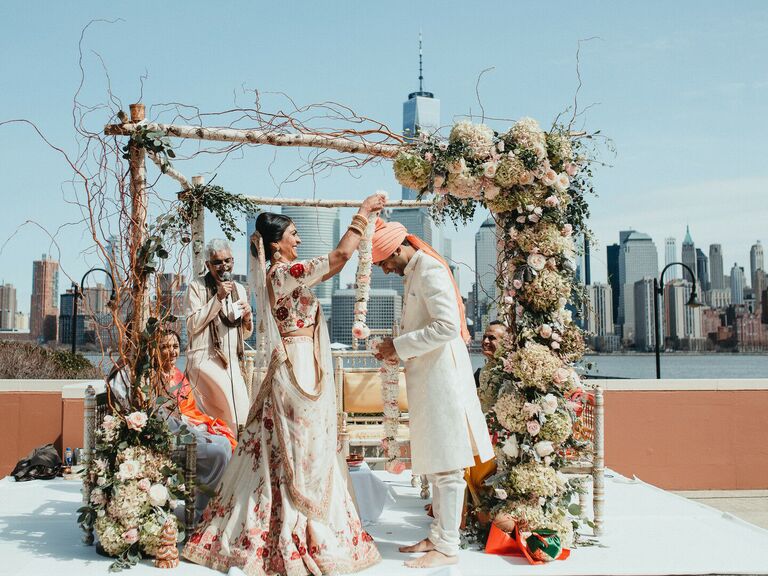 Couple performing traditional Hindu ceremony