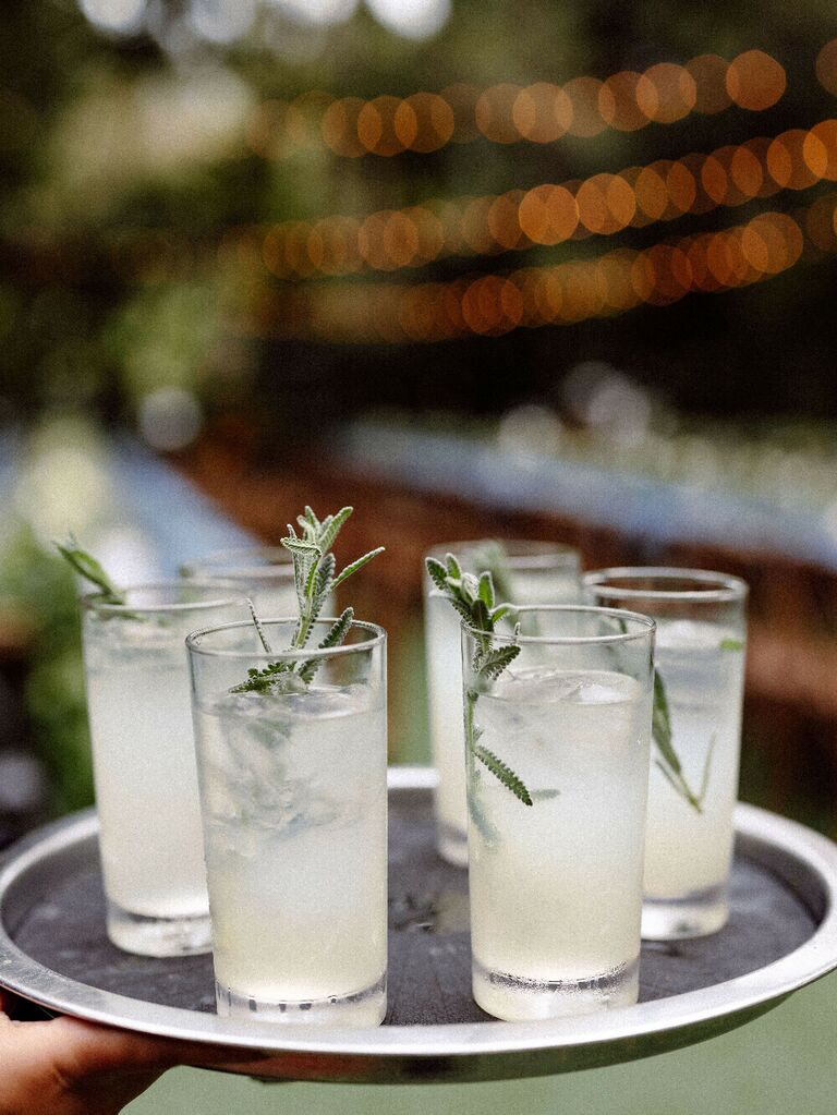 Signature wedding drinks with sprigs of rosemary