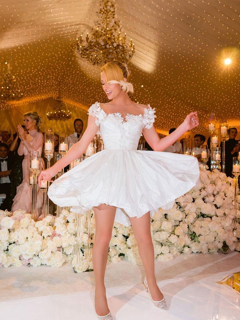 Short white wedding reception dress by Louis Vuitton