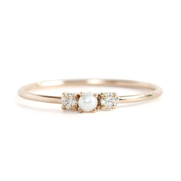 Pearl sandwich engagement ring from Jennie Kwon