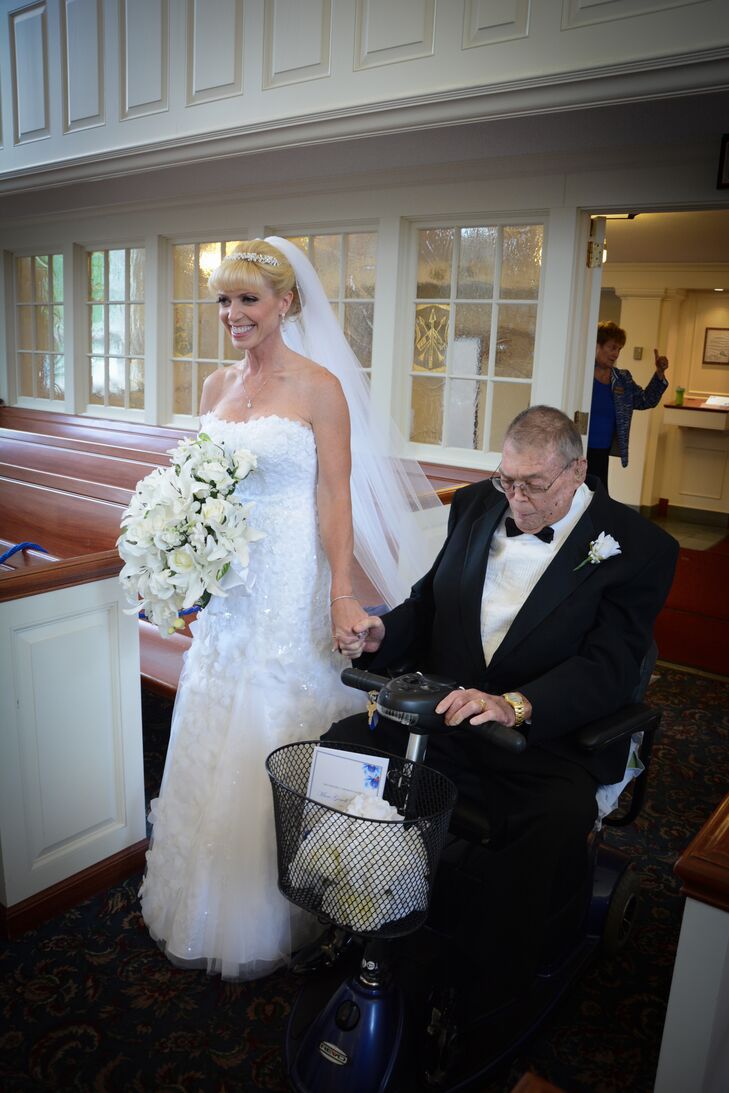 “Genell dress was white strapless, fitted waist and a flowing bottom, and the entire dress had hints of iridescent sequins, flower appliqués, chiffon and tulle,” says Jeffrey. “She wore a cathedral veil with crystal trim and her headpiece was silver with flower appliqué’s, crystals and pearls.”