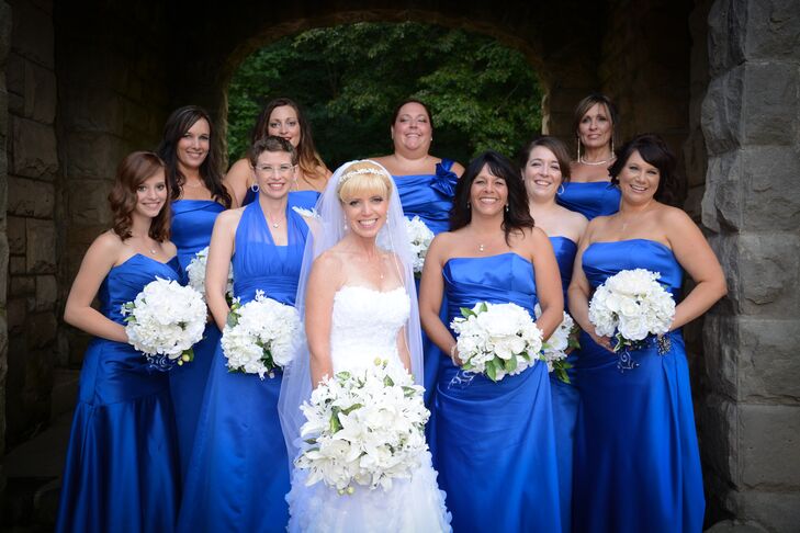 “Bridesmaids selected their own dress style of dress, with the only direction being that it had to be royal blue and long,” says Genell. “Almost all choose strapless with a flowing bottom in satin.”