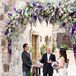 Ximena and Kent exchanged heartfelt vows under a lush floral wedding arch of purple delphinium, roses and greenery.