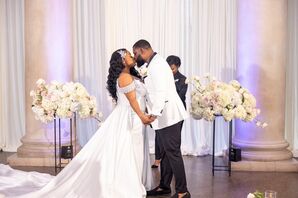 Bride in Off-the-Shoulder Gown Sharing First Kiss With Groom at Modern, Glam Altar