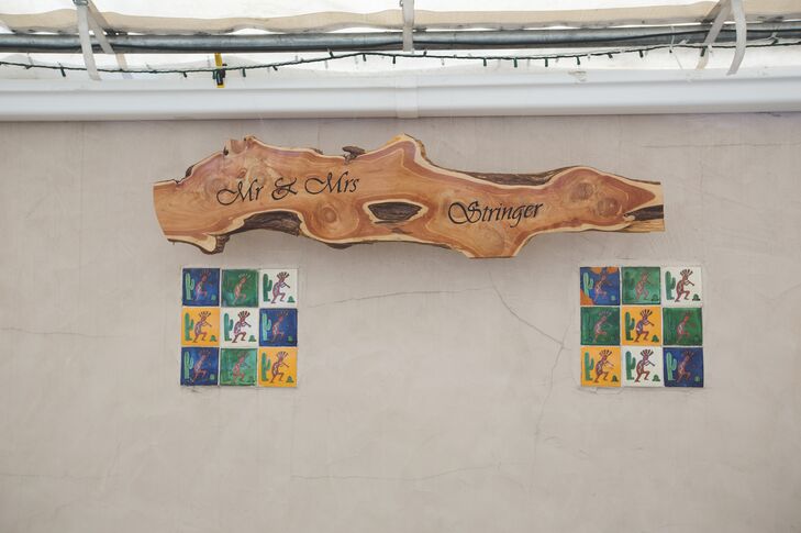 Ben's brother made a custom wooden sign with the couple's names on it.