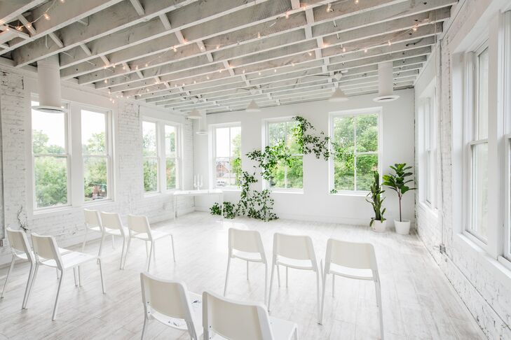 All-White Elopement Ceremony Space Elevated by Simple Greenery