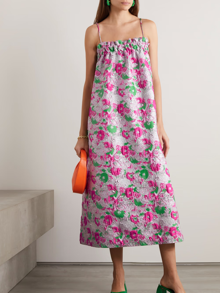 A model shows off this floral slip dress.