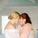 Bride and Mother of the Bride Embracing