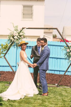 Casual Outdoor Ceremony with Modern Geometric Arch Backdrop