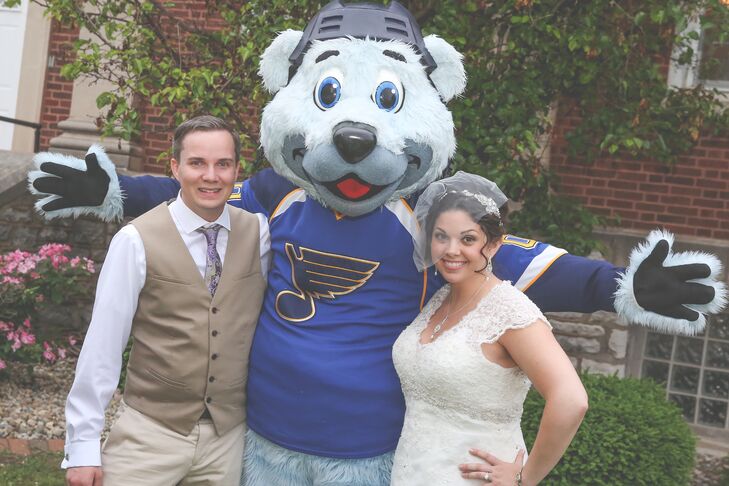 Since Jessica and Joel had their first date at a Blues game (which was also where they met in person for the first time), they invited the team's mascot, Louie, to the reception. "He really got the party started!" Jessica says.