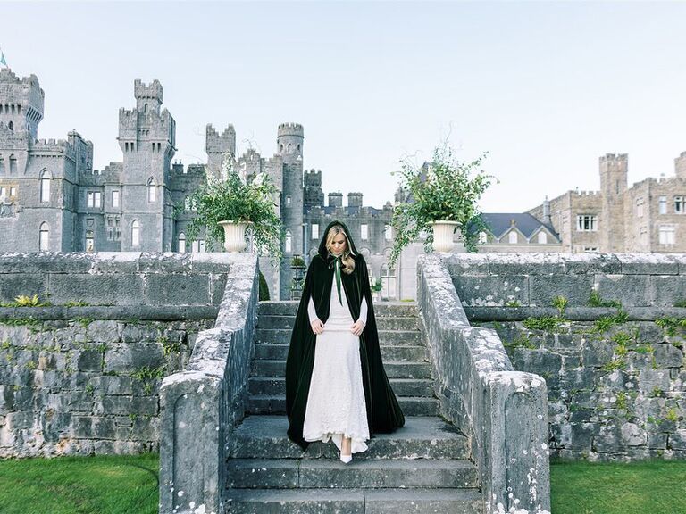 Alice Delahunt's Ralph Lauren wedding dress with green velvet cape