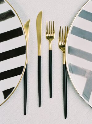 Gold Flatware and Striped Chargers