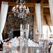 Wispy willow branches gave the floating candle centerpieces a whimsical wintery look.