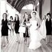 Suzanne wore a gorgeous Romona Keveza gown for the ceremony, while her maids were dressed in tops by Vera Wang and skirts from Ann Taylor.