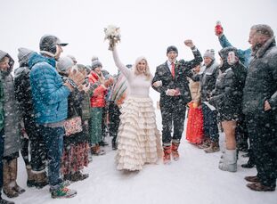 Merril Hermanson and Josh Pope knew their winter wedding would be snowy, but they weren't expecting a full-on blizzard. But despite the freezing tempe