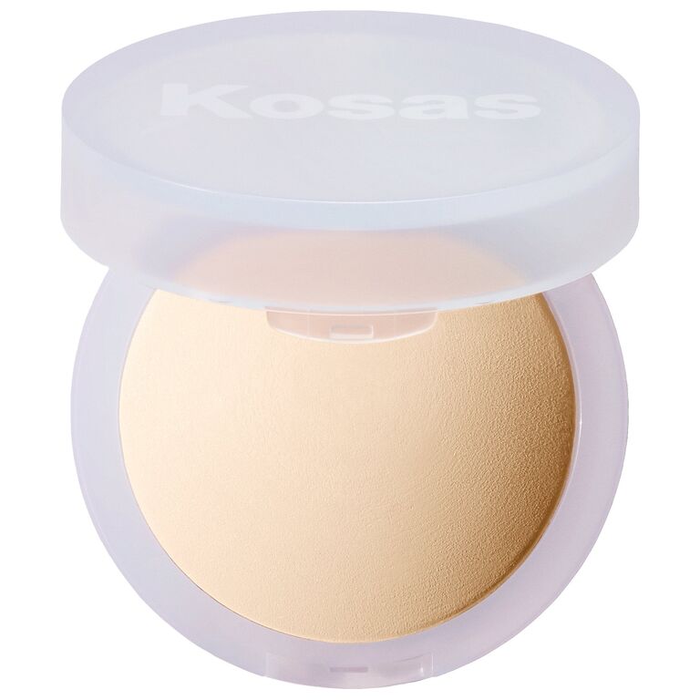 Kosas setting powder in a round compact. 