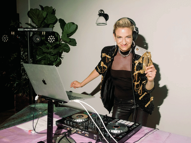 Wedding DJ playing top 100 love songs for wedding.