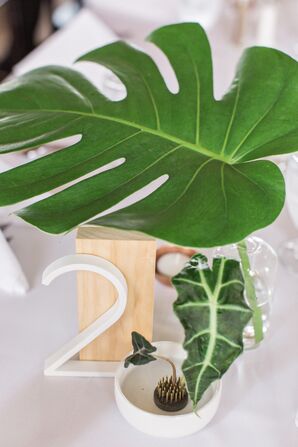Minimal Banana Leaf Centerpiece with Modern Table Number