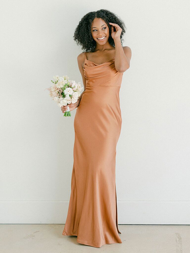 Revelry gold satin fall bridesmaid dress with cowl neckline and elegant ruching