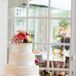 Four-Tier White and Ivory Buttercream Wedding Cake