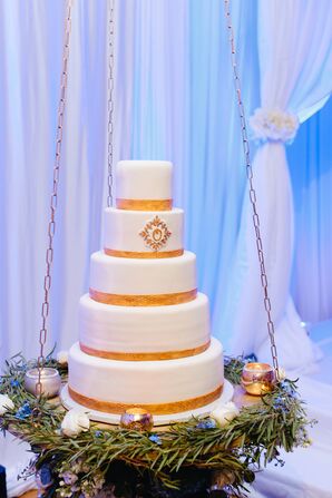 Swinging Five-Tier White and Gold Cake with Monogram