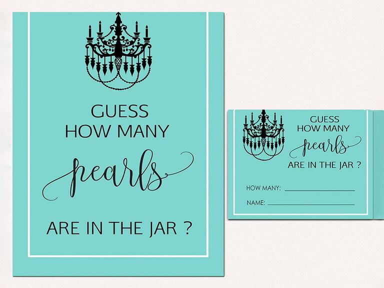 'Guess how many pearls are in the jar' in black type and chandelier graphic on Tiffany blue background