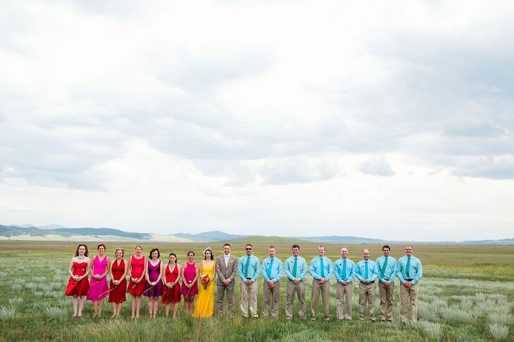 “With the feeling of celebration leading our style choices, the bridesmaids were to choose their dress of fuchsia to red hues and the groomsmen wore gingham print button down shirts in vibrant shades of teal and blue topaz.”