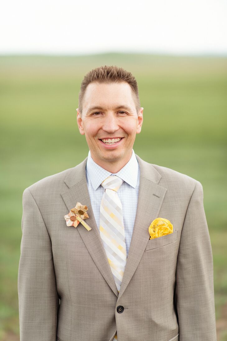 Jason wore a taupe linen suit with a plaid tie in the same yellow as Shauna’s dress. “I used the leftover fabric from my altered gown to make the groom's pocket silk,” she says. “He did not know what color dress I was wearing until it was revealed on our wedding day. I wrapped up his tie, socks and pocket silk and had it delivered to his room before he got dressed. It was at that moment he discovered that I was wearing a yellow dress."