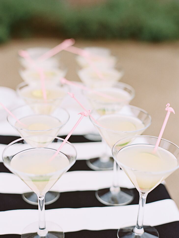 Pink flamingo stirrers added a cute touch to the couple's signature cocktails.