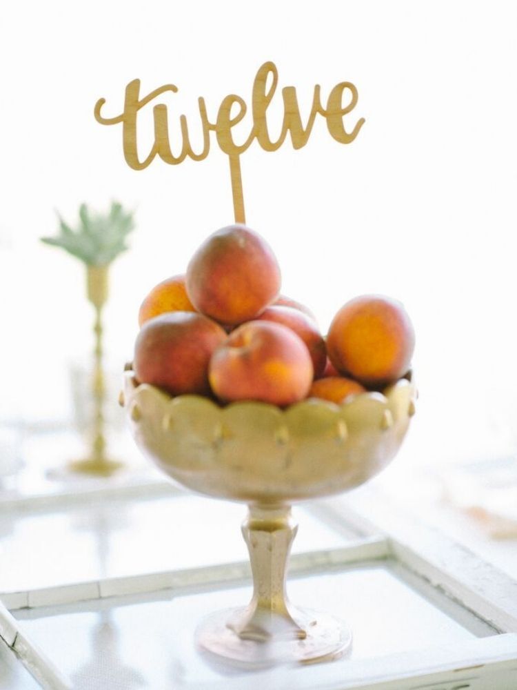 peach centerpiece with calligraphed table number