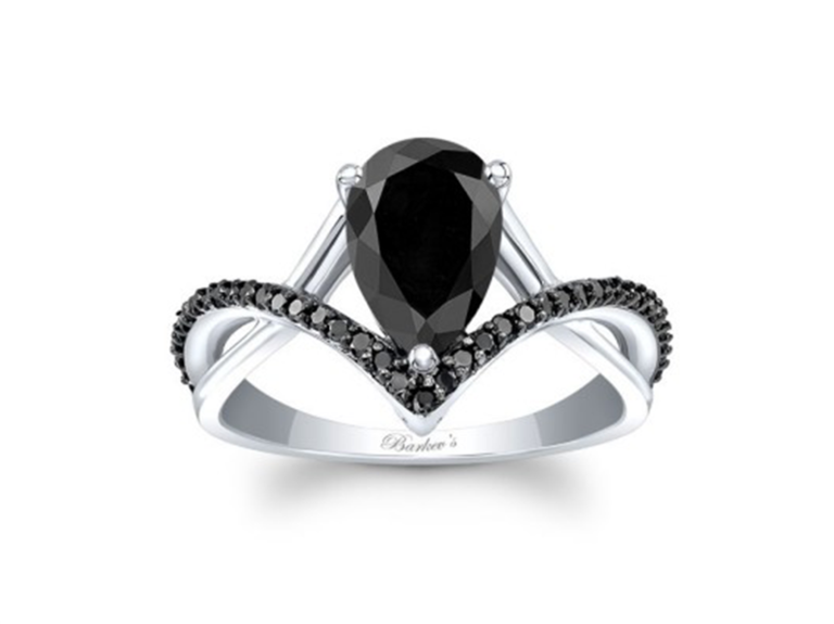 Pear shaped black diamond center with silver and black pave diamond twisted band